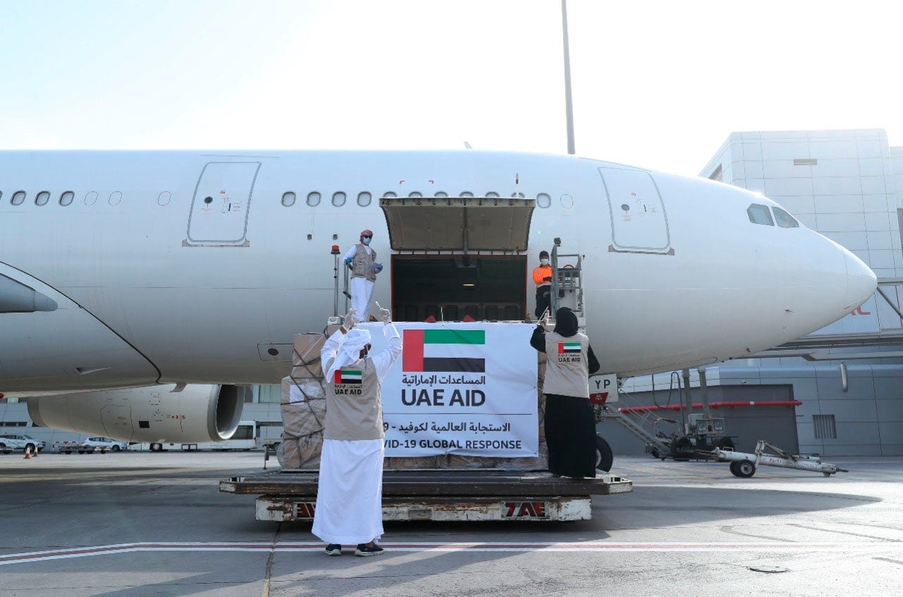 An Etihad Airways flights loaded with aid for the Palestinians to fight the coronavirus pandemic is loaded in Abu Dhabi