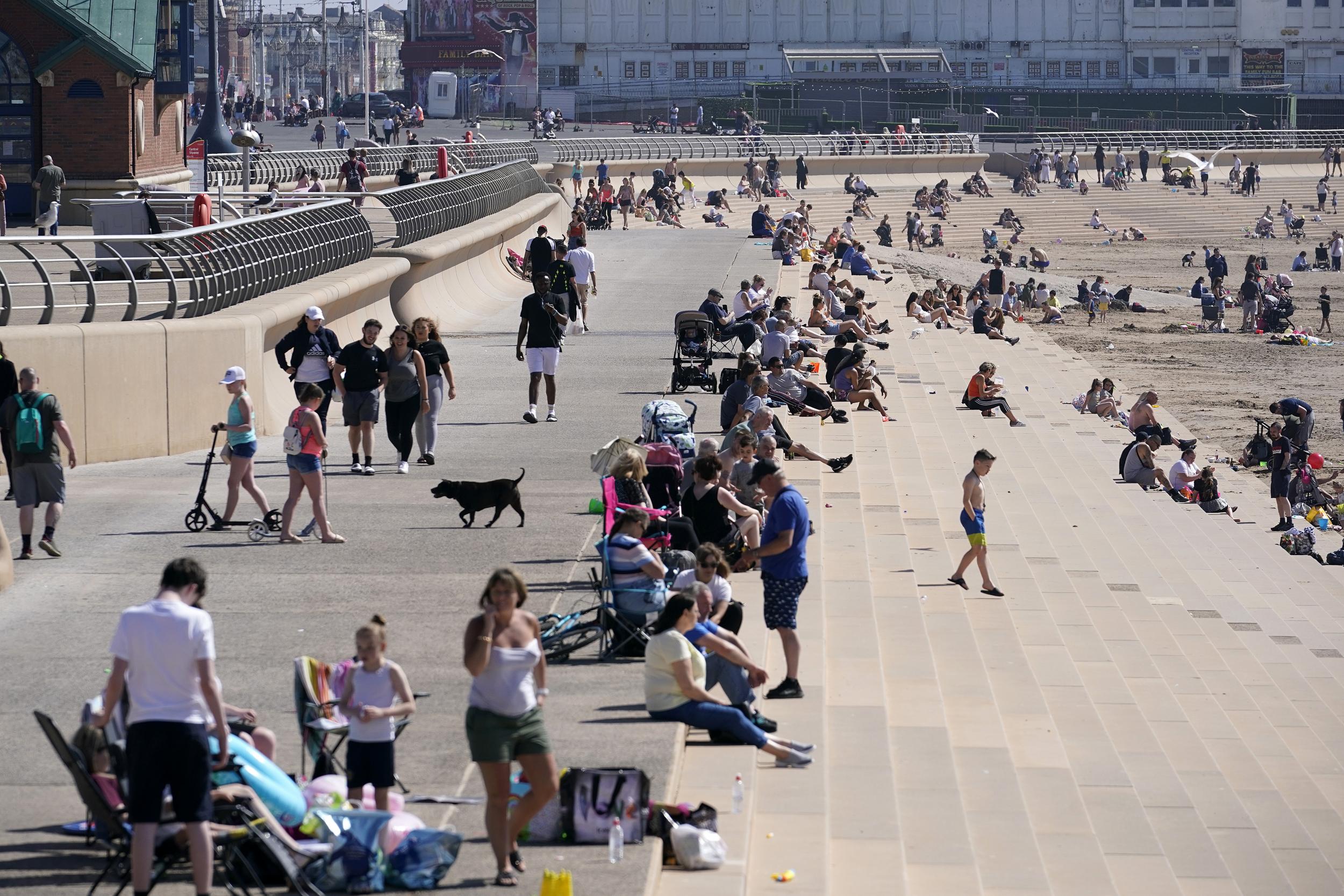 The warm temperatures lured sunbathers across the country and tested the capacity of parks and beaches to accommodate social distanced crowds (Getty Images)
