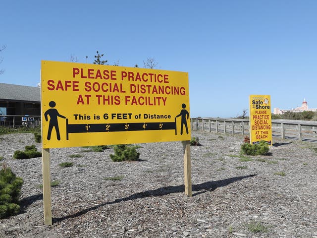 A social distancing sign at the Lido Beach in New York