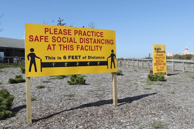 A social distancing sign at the Lido Beach in New York