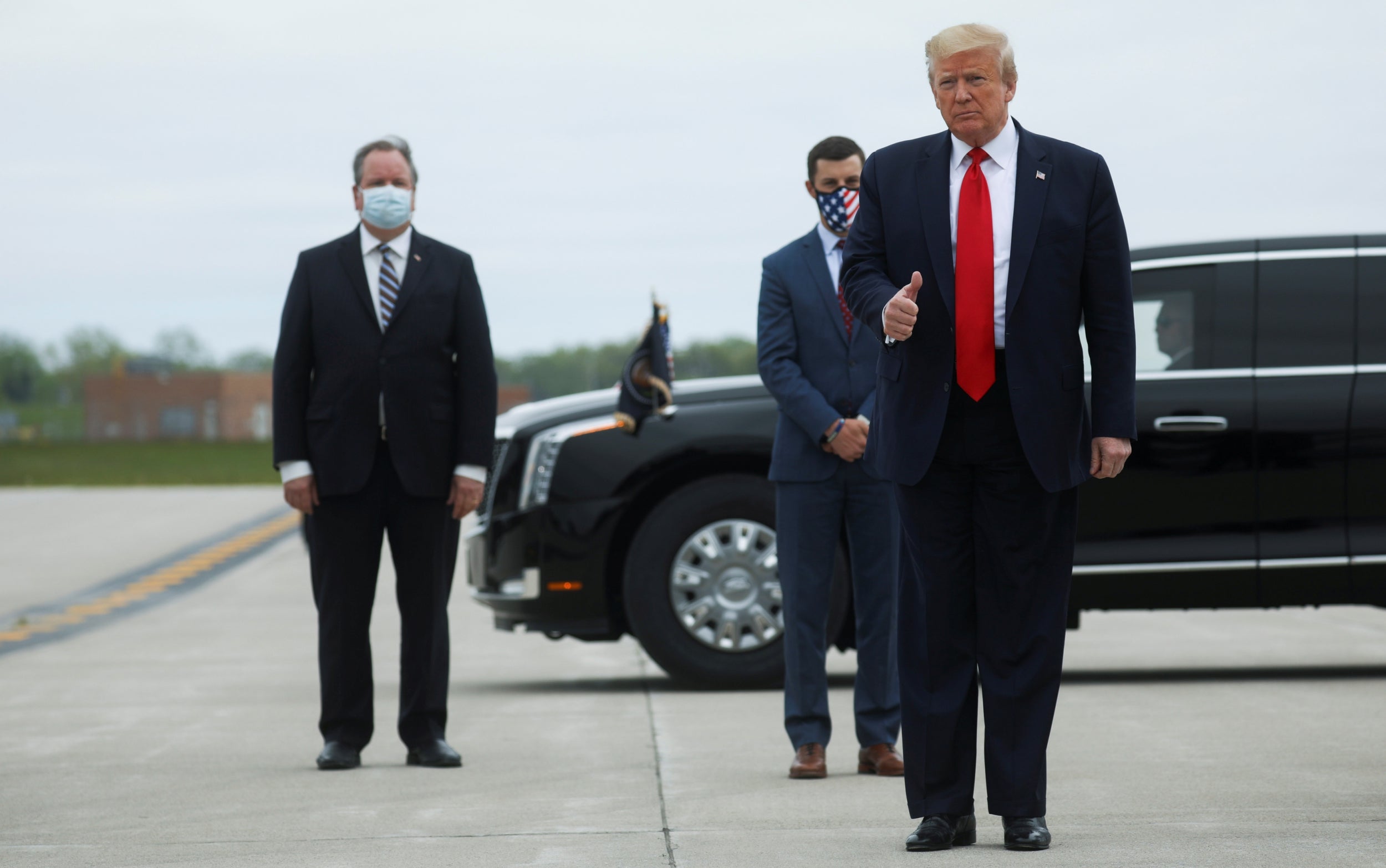 Donald Trump arrives at Detroit international airport on a visit to Michigan during the coronavirus pandemic
