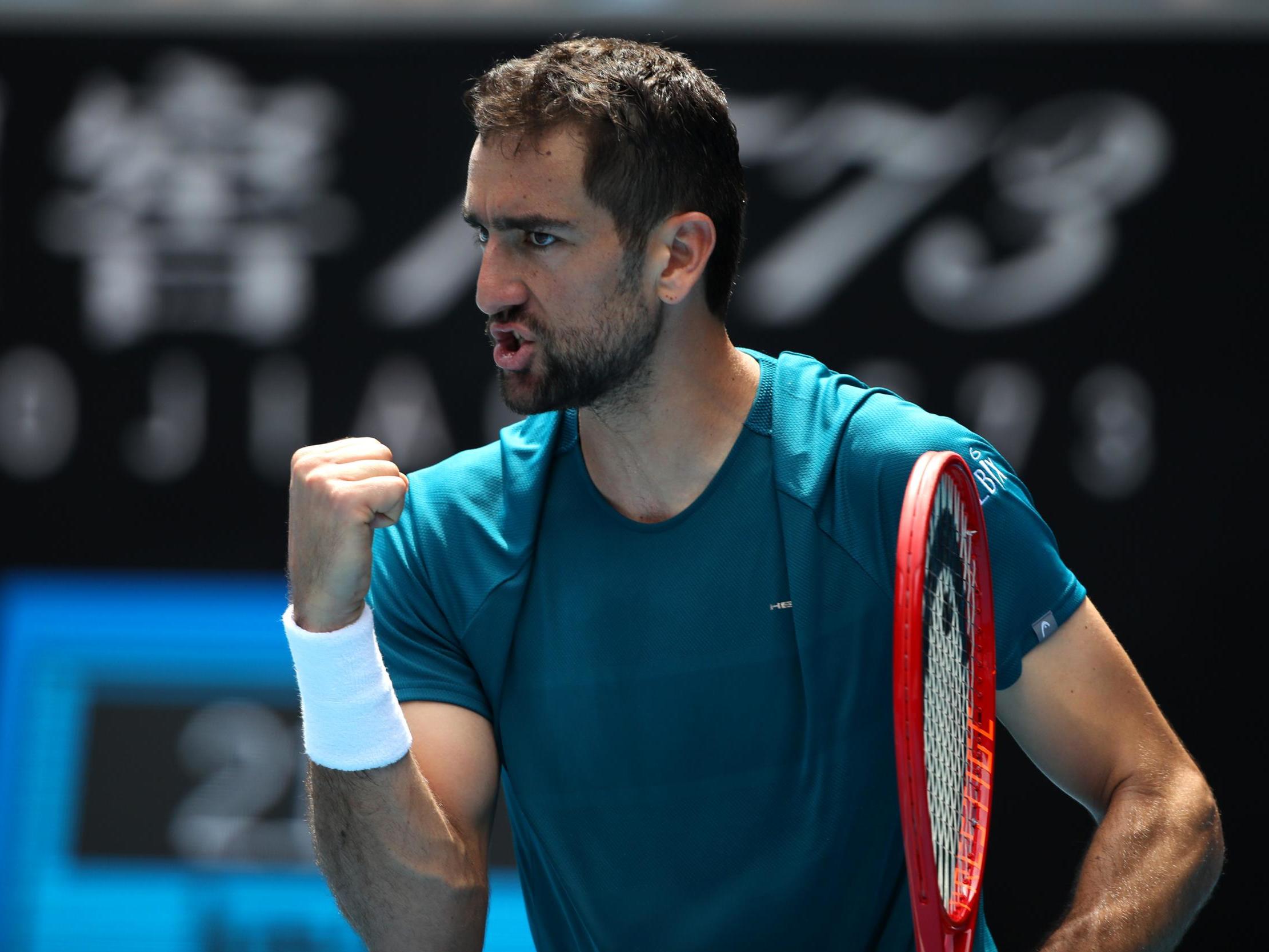 Marin Cilic of Croatia plays a backhand
