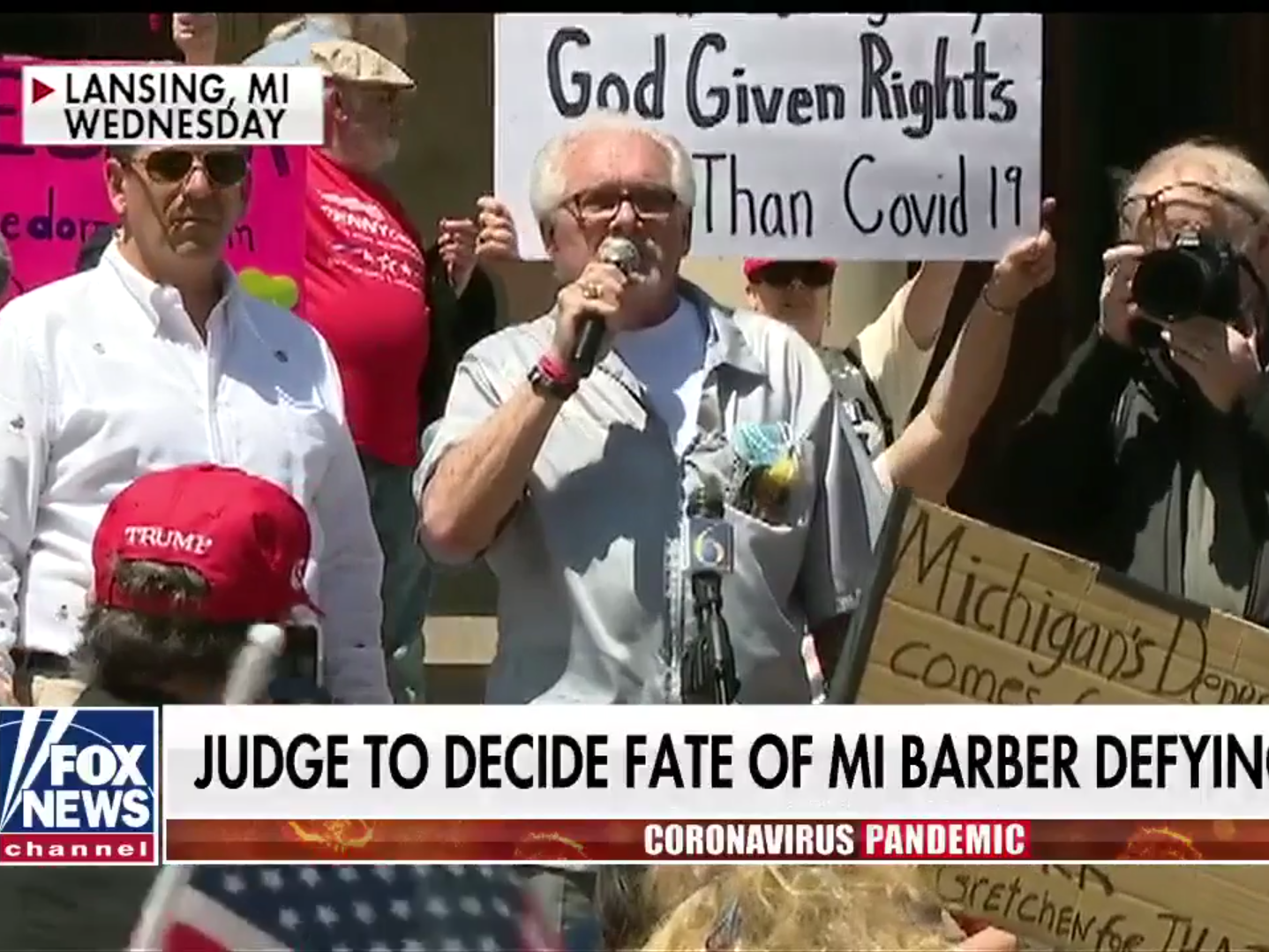 Barber who defied Michigan coronavirus lockdown can continue, says court
