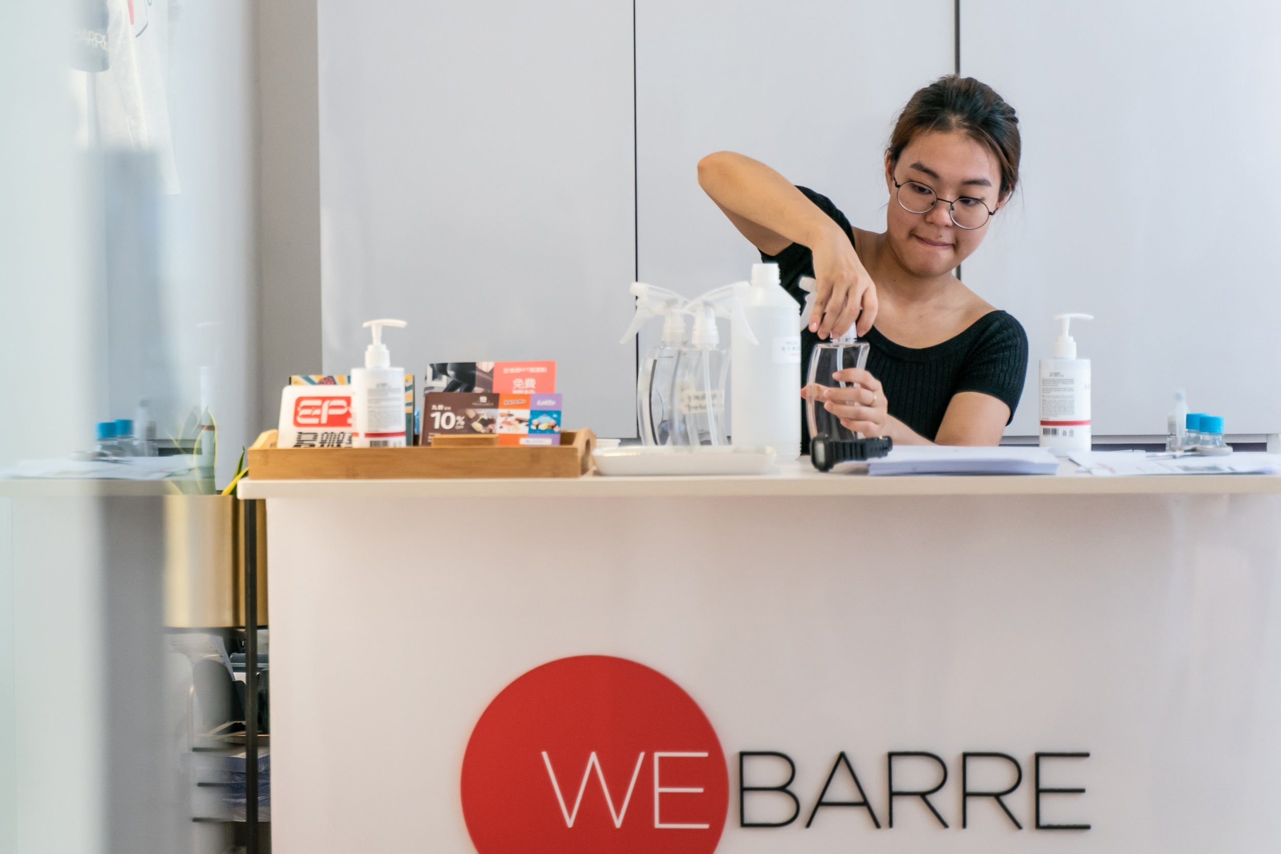 Bottles are filled with disinfectant ahead of class (The Washington Post)