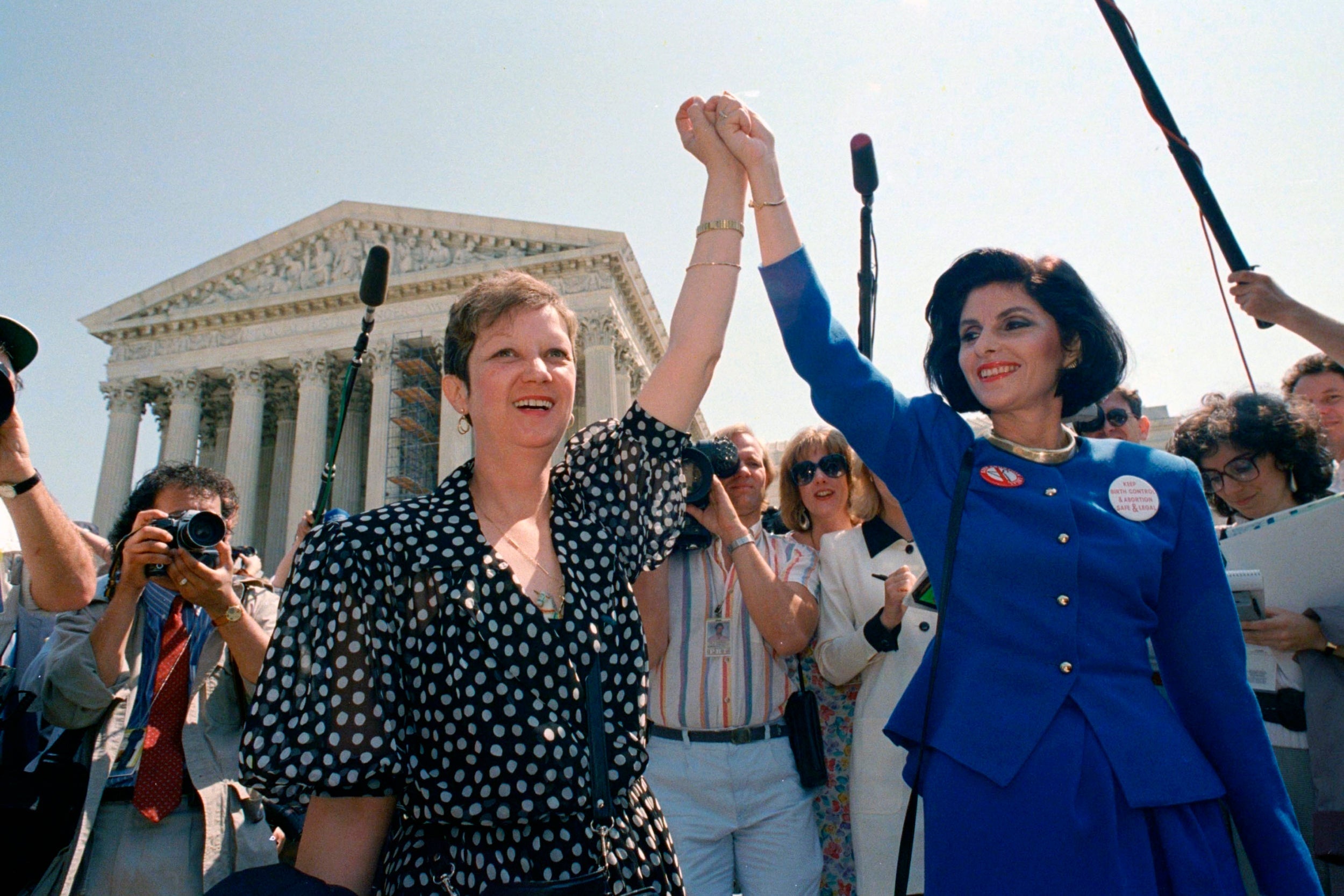 1989: Norma McCorvey and her attorney Gloria Allred leaving the Supreme Court