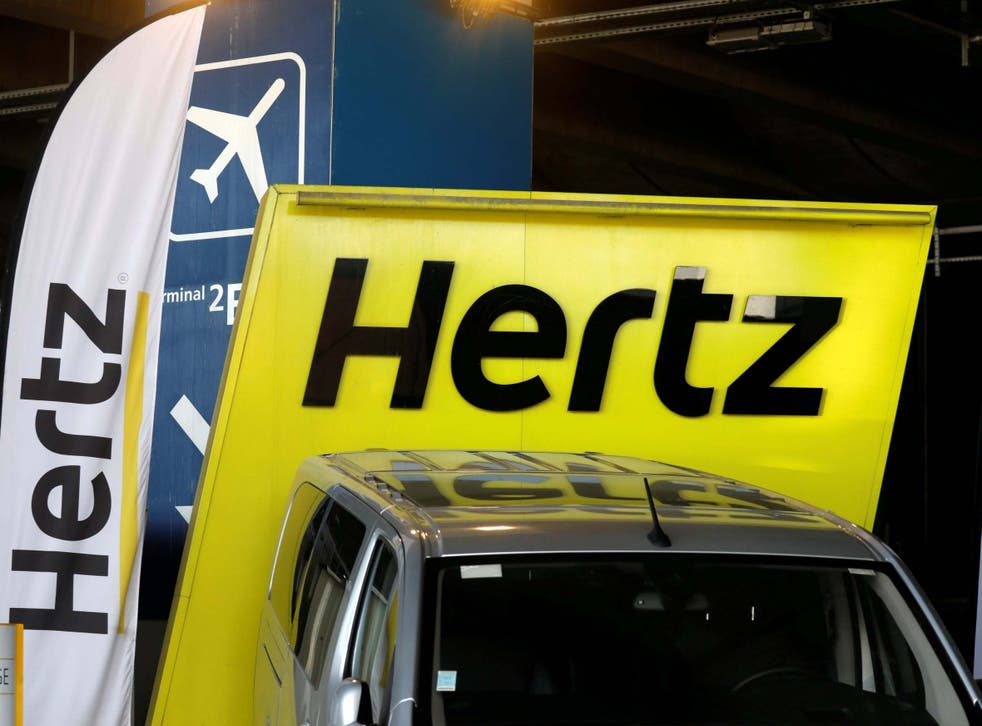 Logos of car rental company Hertz are seen outside Paris Charles de Gaulle airport in Roissy-en-France during the outbreak of the coronavirus disease (COVID-19) in France