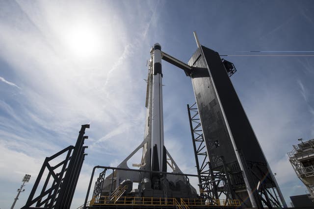 SpaceX Falcon 9 rocket with the company's Crew Dragon spacecraft onboard is seen on the launch pad at Launch Complex 39A as preparations continue