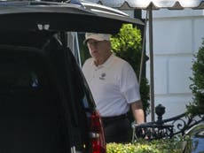 Trump heads to golf course as US coronavirus death toll nears 100,000