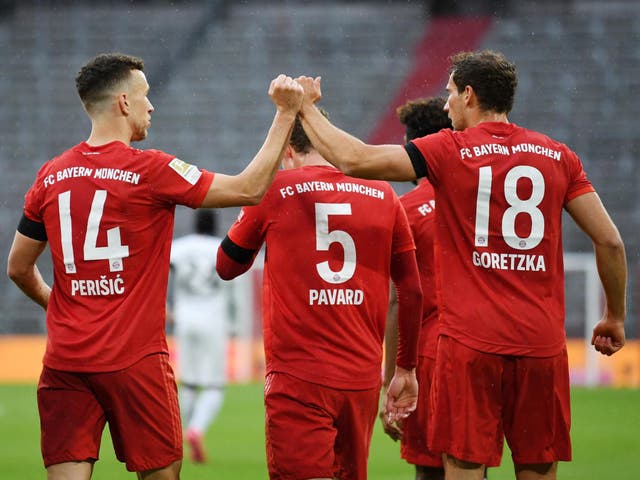 Bayern Munich's Leon Goretzka celebrates scoring their first goal with Ivan Perisic
