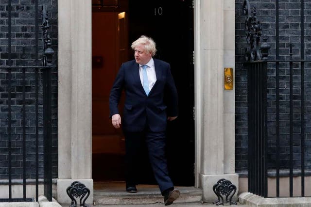 Johnson steps outside 10 Downing Street to join in the nationwide Clap for Carers on Thursday