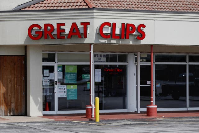 The Great Clips hair salon on South Glenstone Avenue, where two stylists have tested positive for Covid-19