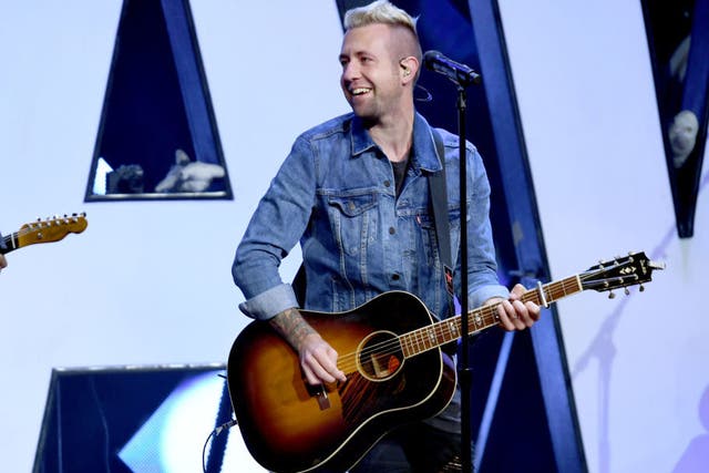NASHVILLE, TN - MAY 28: Jon Steingard of Hawk Nelson performs onstage at the 5th Annual KLOVE Fan Awards at The Grand Ole Opry on May 28, 2017 in Nashville, Tennessee.