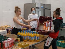 Help the Hungry sees teenage volunteers sort goods for London families