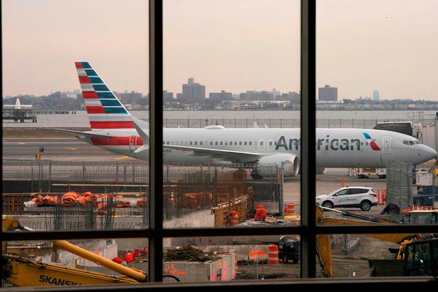 An American Airlines 737 Max sitting at the gate at LaGuardia airport in New York