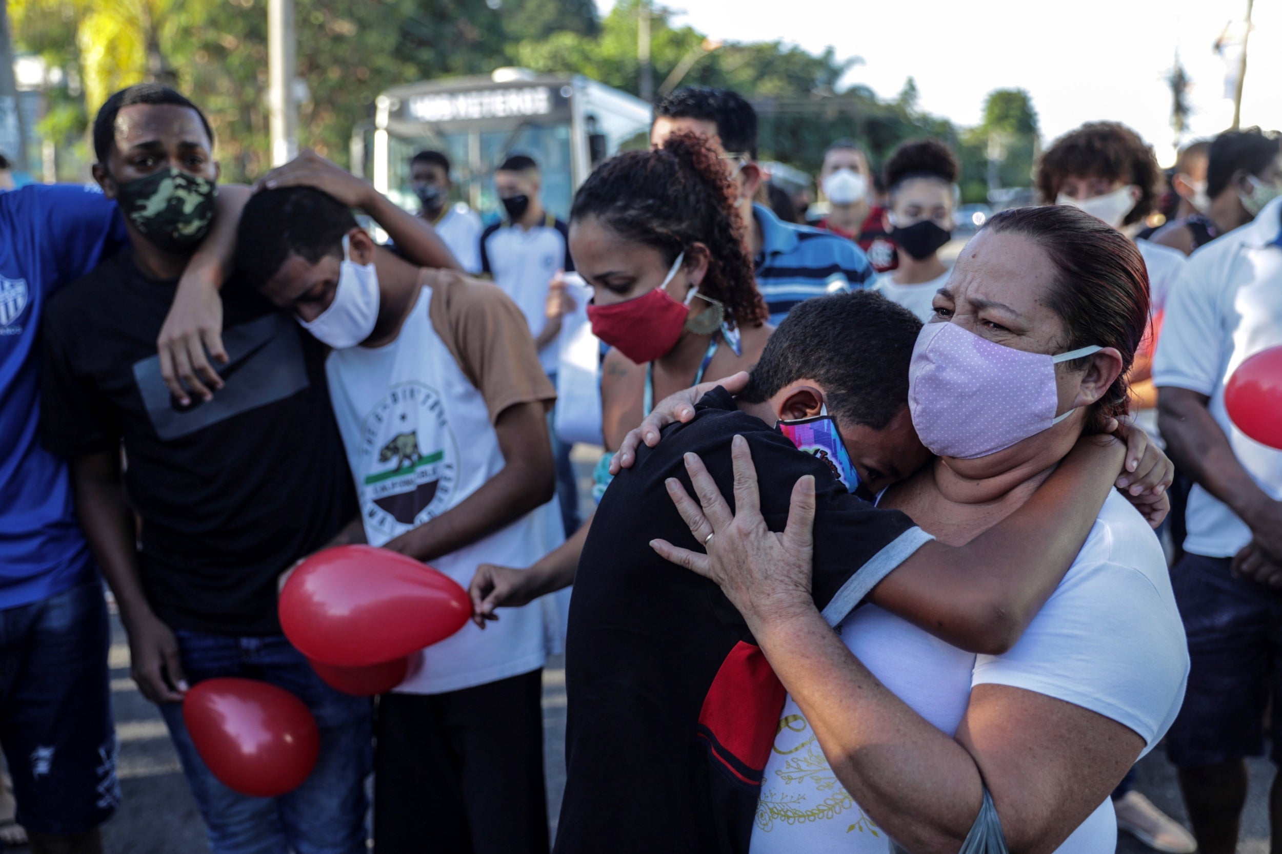 Friends and family mourn the death of Joao Pedro Matos Pinto, who was killed by police