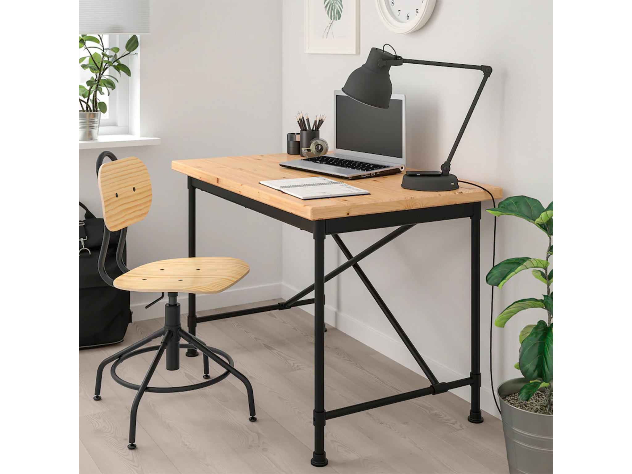 While working from home, get a good desk and chair that will help your posture, help with productivity and separate your work life from your free time