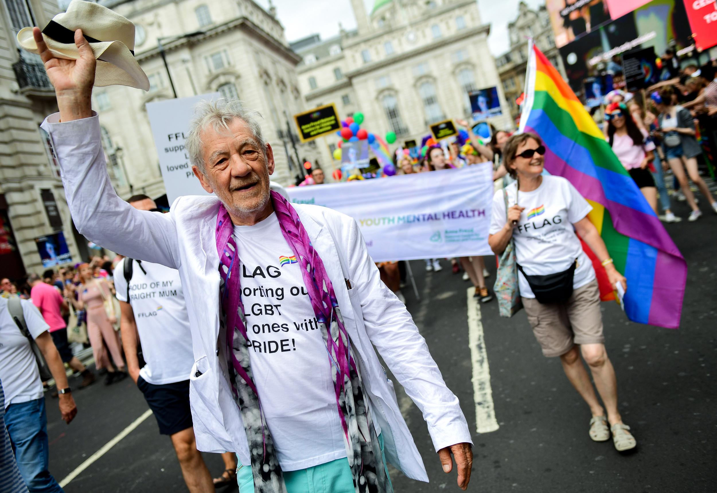 Sir Ian McKellen walking through Piccadilly Circus during Pride in London 2019.