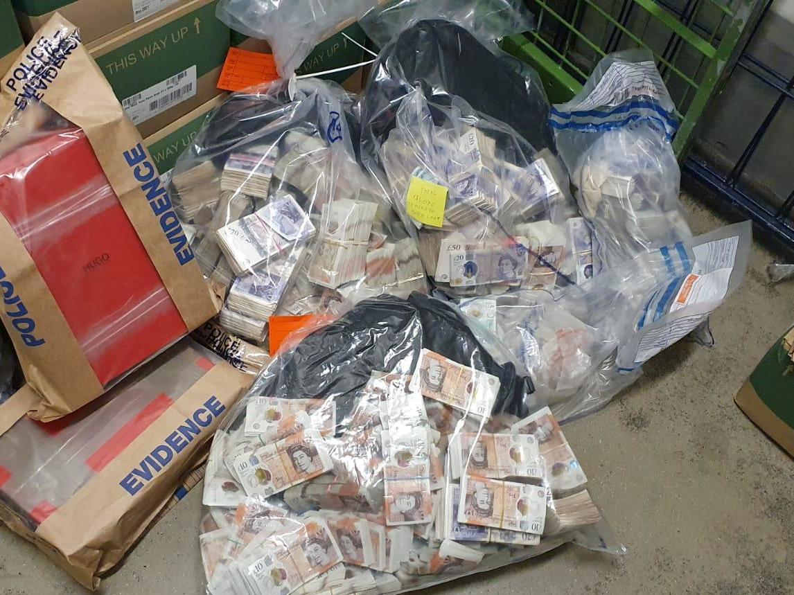 Bags of cash found as part of seizure of a suspected £1m in criminal proceeds in London on 26 May
