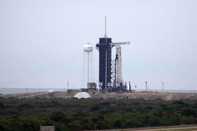 The SpaceX Falcon 9 rocket with the manned Crew Dragon spacecraft sits on launch pad 39A at the Kennedy Space Center on May 27, 2020 in Cape Canaveral, Florida
