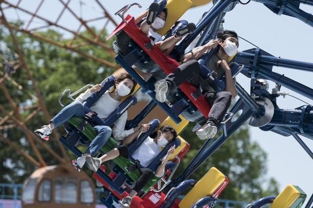 Japanese amusement parks ask visitors to refrain from 'speaking loudly' (Getty)