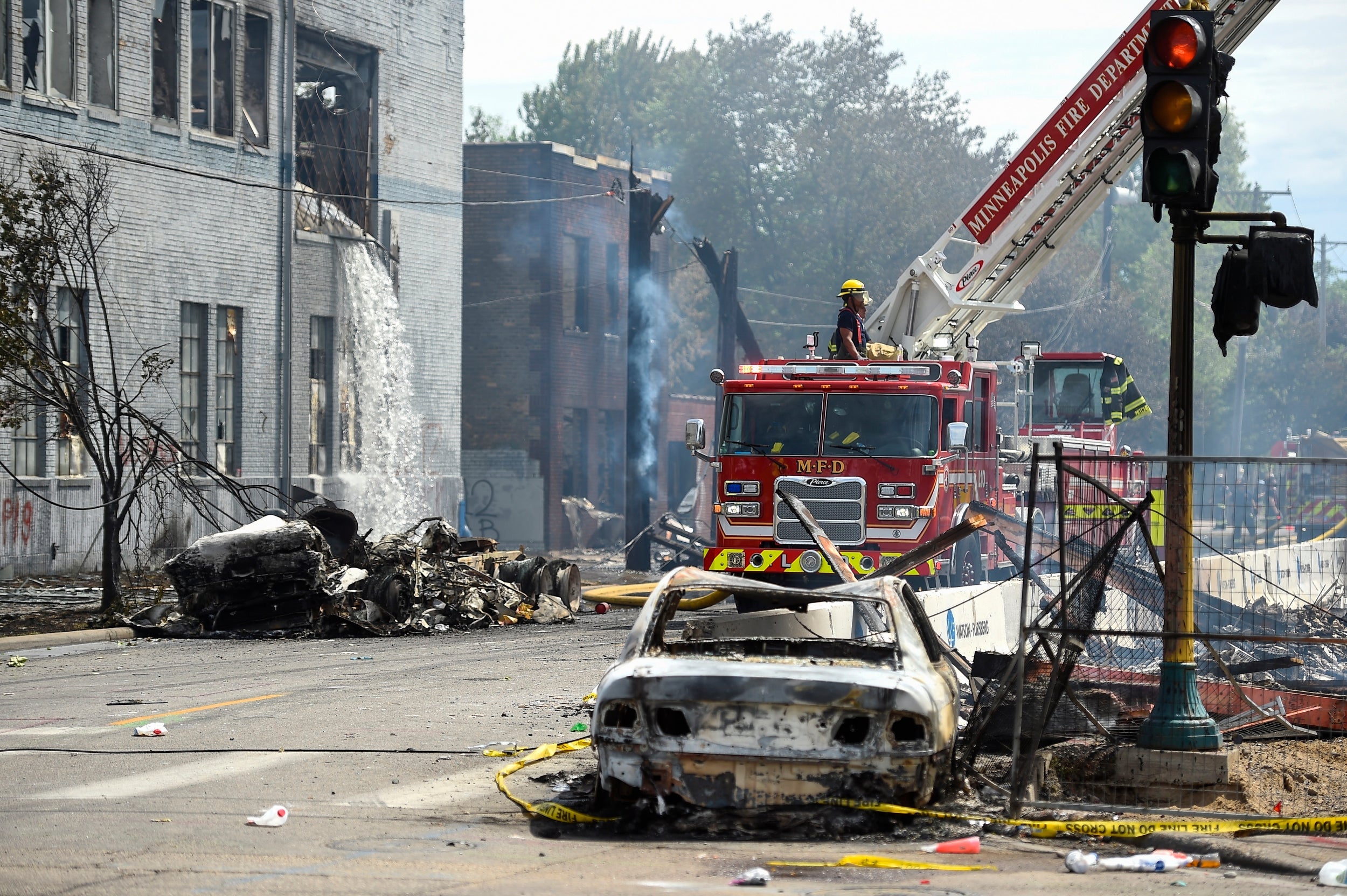 Minnesota governor activates national guard to respond to violence over George Floyd protests