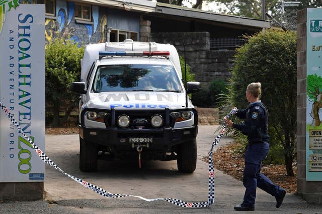 Police work at the Shoalhaven Zoo in Nowra, Australia, Friday, May, 29, 2020, where an animal keeper has been critically injured