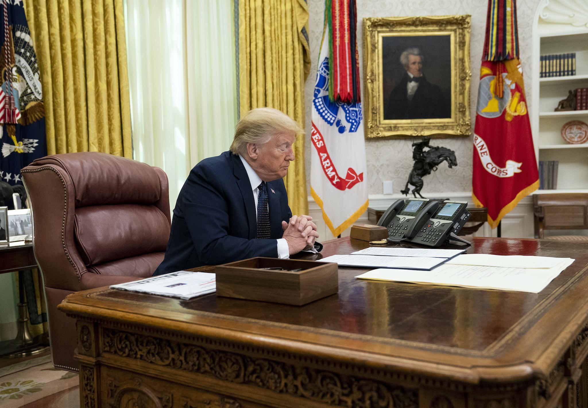 President Donald Trump with Attorney General William Barr, make remarks before signing an executive order in the Oval Office that will punish Facebook, Google and Twitter for the way they police content online