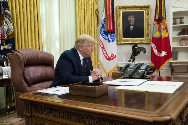 President Donald Trump with Attorney General William Barr, make remarks before signing an executive order in the Oval Office that will punish Facebook, Google and Twitter for the way they police content online