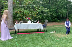 Seven year-old boy throws backyard prom for his babysitter