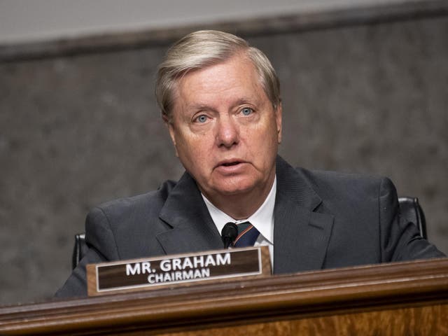 Lindsey Graham peaks during a Senate Judiciary Committee nomination hearing for Justin Reed Walker to be United States Circuit Judge for the District of Columbia Circuit