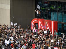 Atlanta protesters attack CNN building as mayor says: 'Go home'