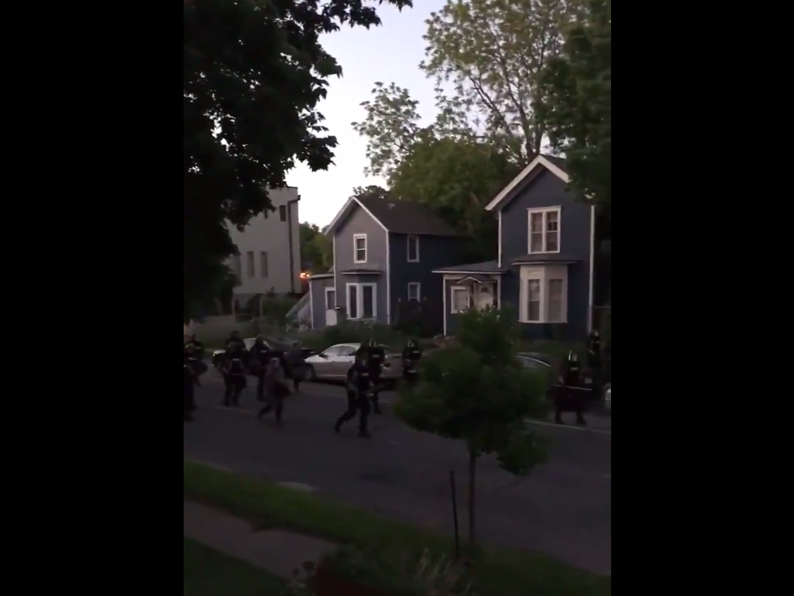 Police officers and National Guard forces on a street in Minneapolis on 30 May, 2020