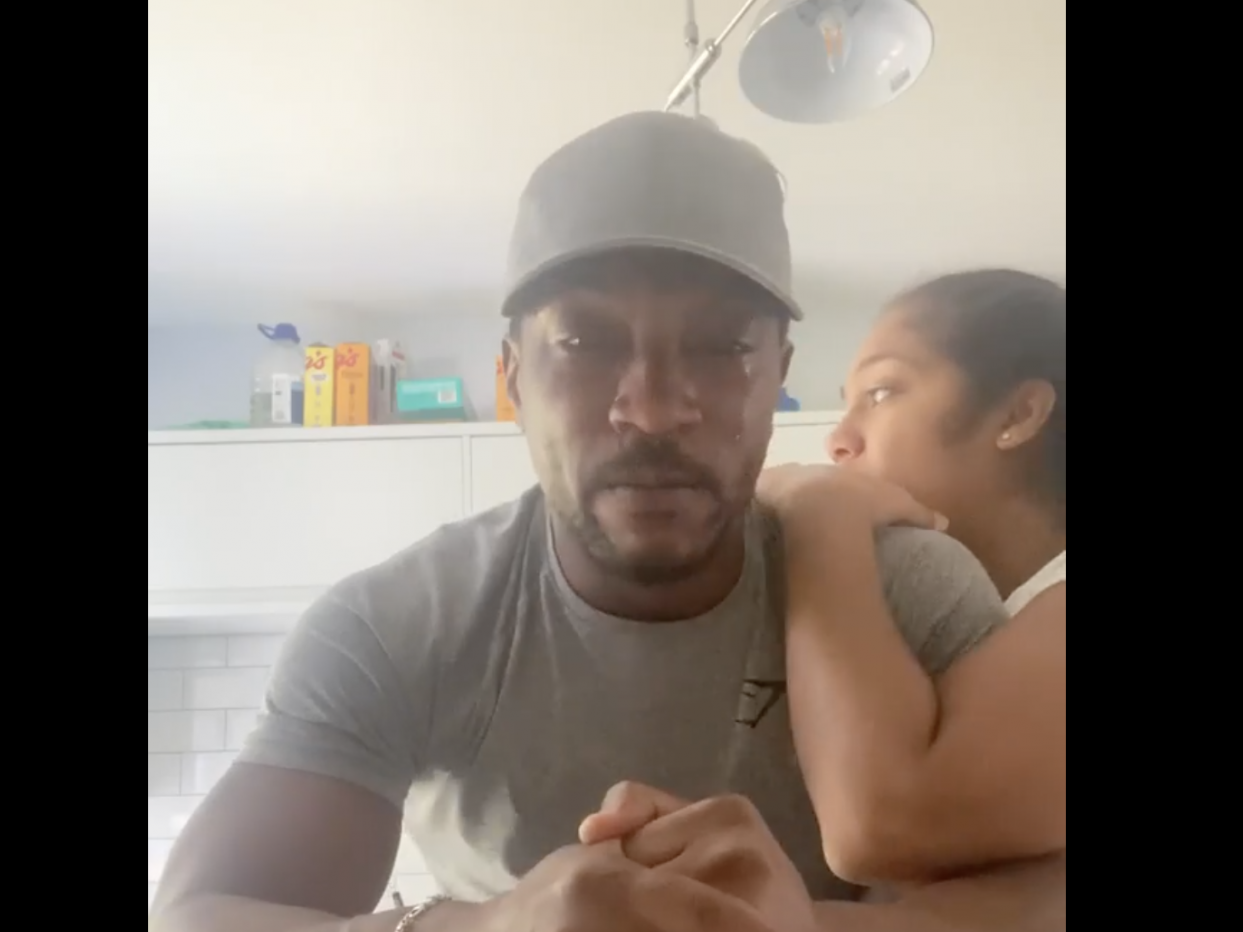 Ashley Walters is comforted by his wife Danielle as he cries in Instagram video