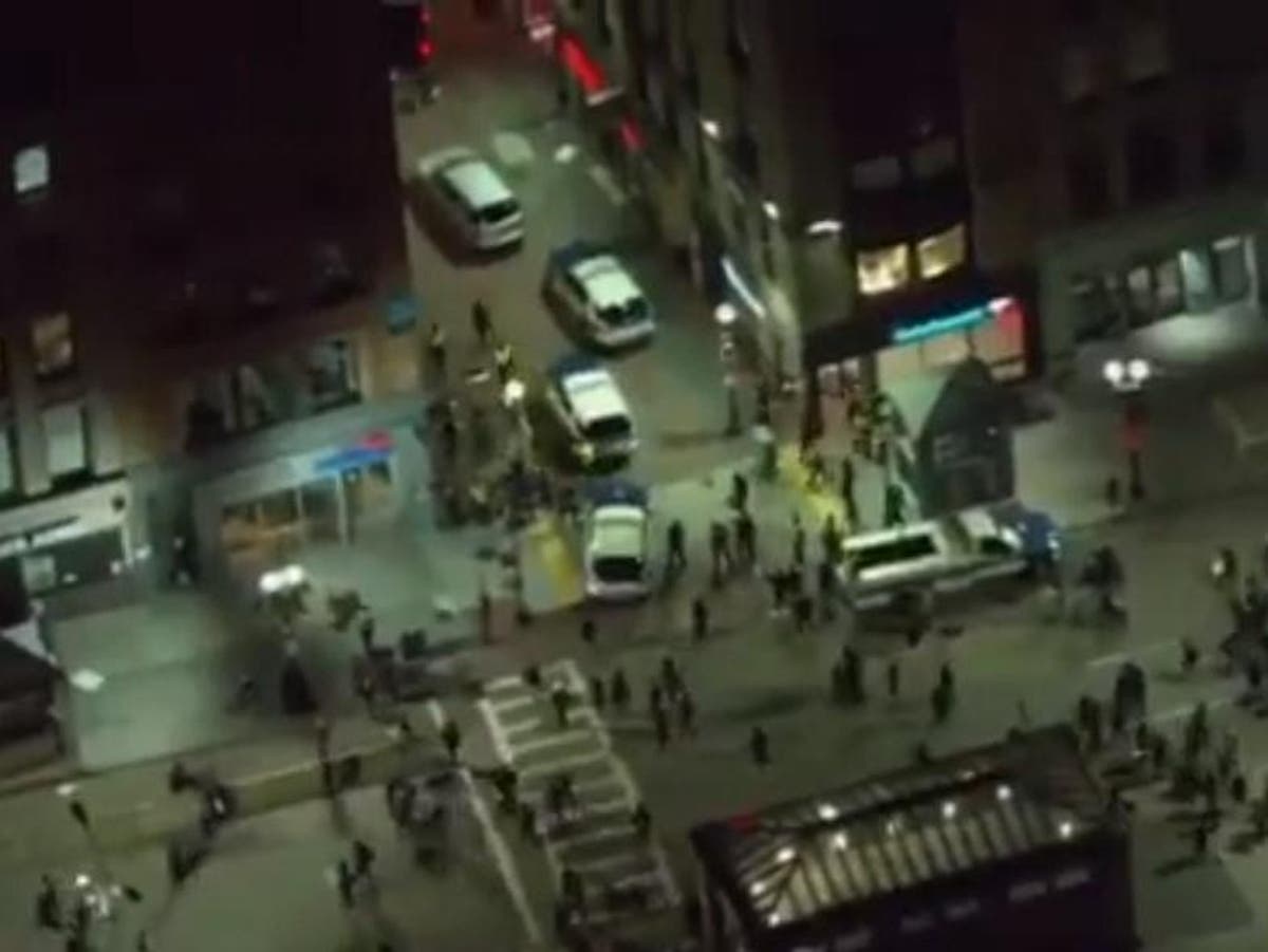 Car appears to run over protesters live onair in Boston amidst