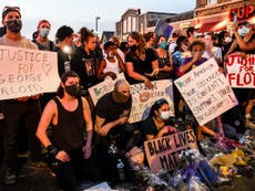George Floyd protestors clash with police in cities across US