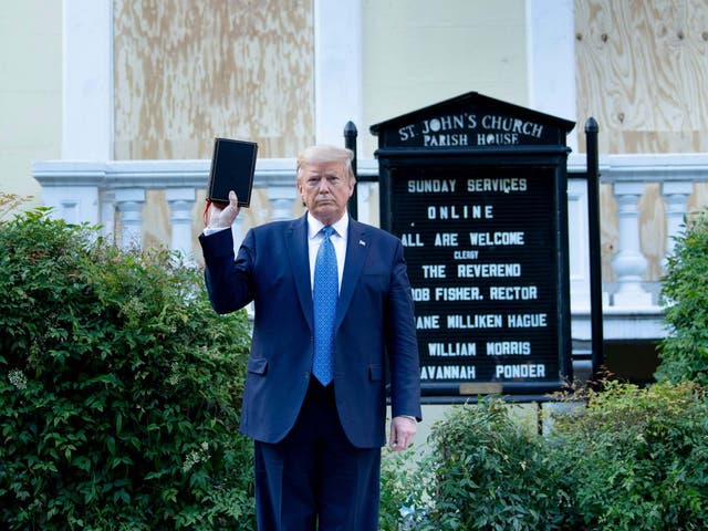 US president Donald Trump outside St. John's Church across from the White House