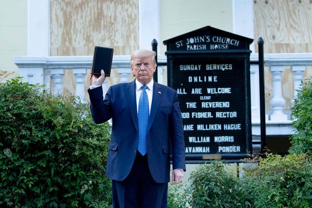 US president Donald Trump outside St. John's Church across from the White House