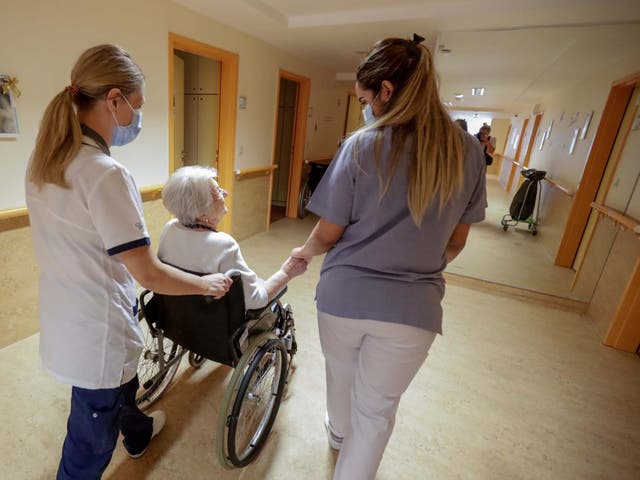 Sir John Major said people tended to overlook the contribution of care workers and other low-paid employees