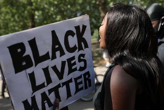 Protesters take part in a 'Black Lives Matter' demonstration on 1 June 2020 in London, England