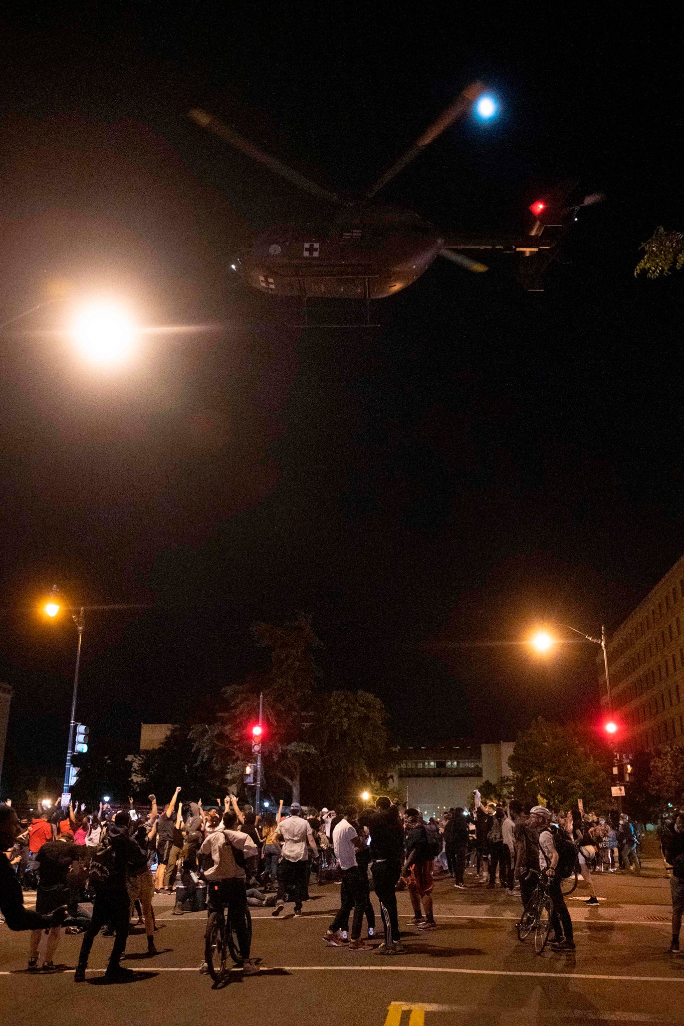 Red Cross helicopter is used to disperse protesters