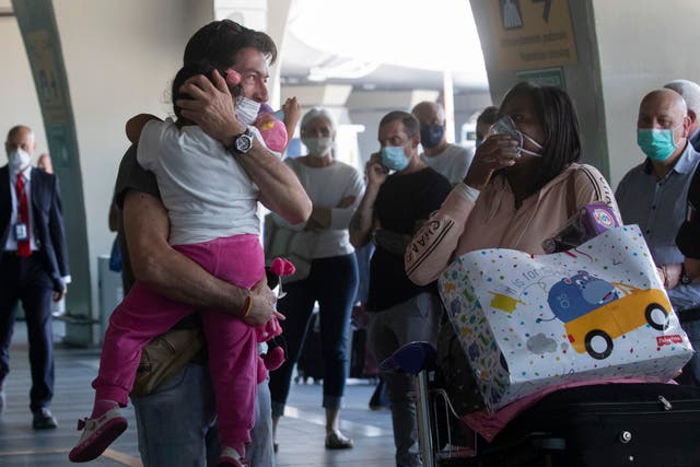 Families reunite at at Rome's Fiumicino airport