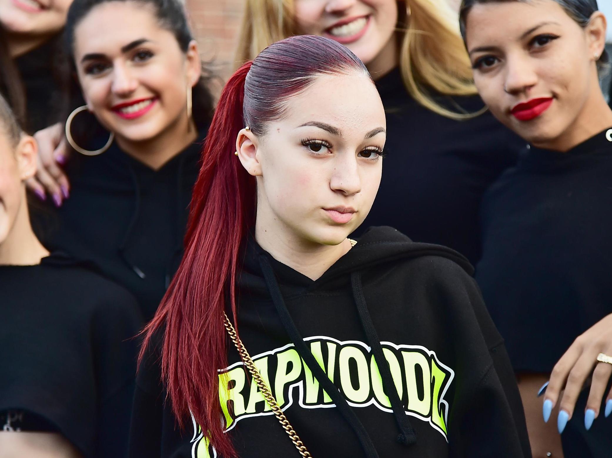Bhad Bhabie (2nd R) poses with festivalgoers backstage during Day 2 of Billboard Hot 100 Festival