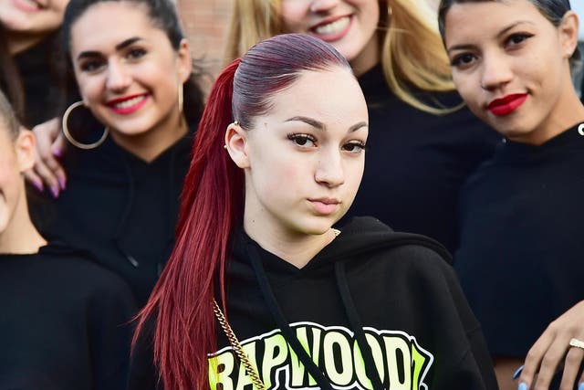 Bhad Bhabie (2nd R) poses with festivalgoers backstage during Day 2 of Billboard Hot 100 Festival