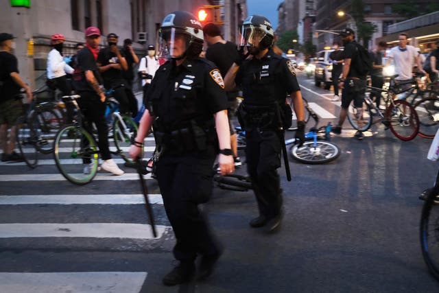 Police across the world, as seen here in New York, have made dozens of arrests as demonstrations continue