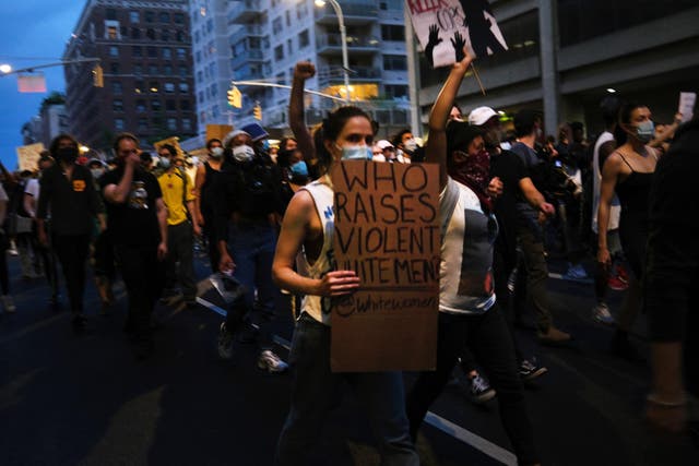 Protesters march in Manhattan over the killing of George Floyd by a Minneapolis Police officer