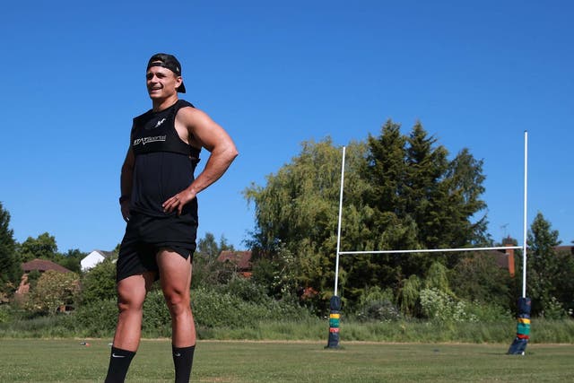 Northampton Saints' Tom Collins training in a park with rugby union in England on hold due to coronavirus