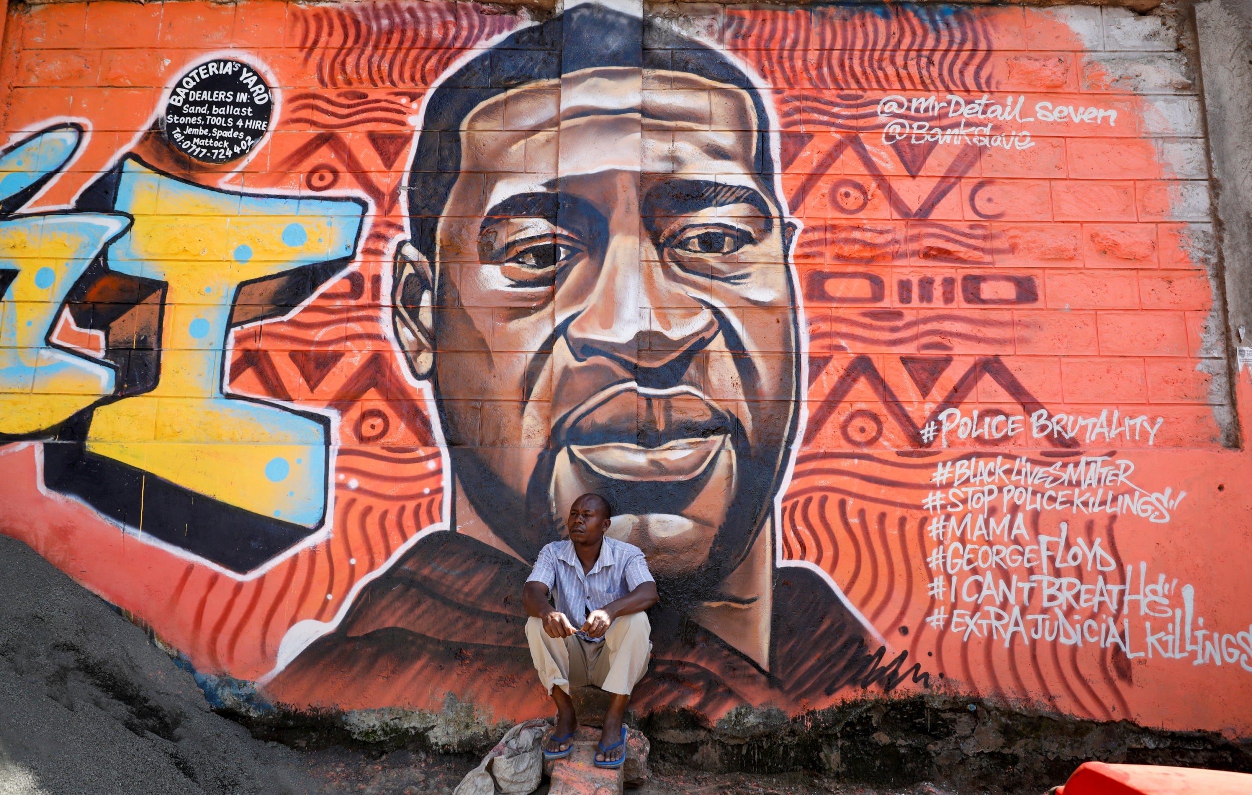 A mural of George Floyd who died by asphyxiation after a white police officer knelt on his neck for over eight minutes