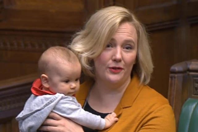 Stella Creasy holds her baby daughter in the House of Commons