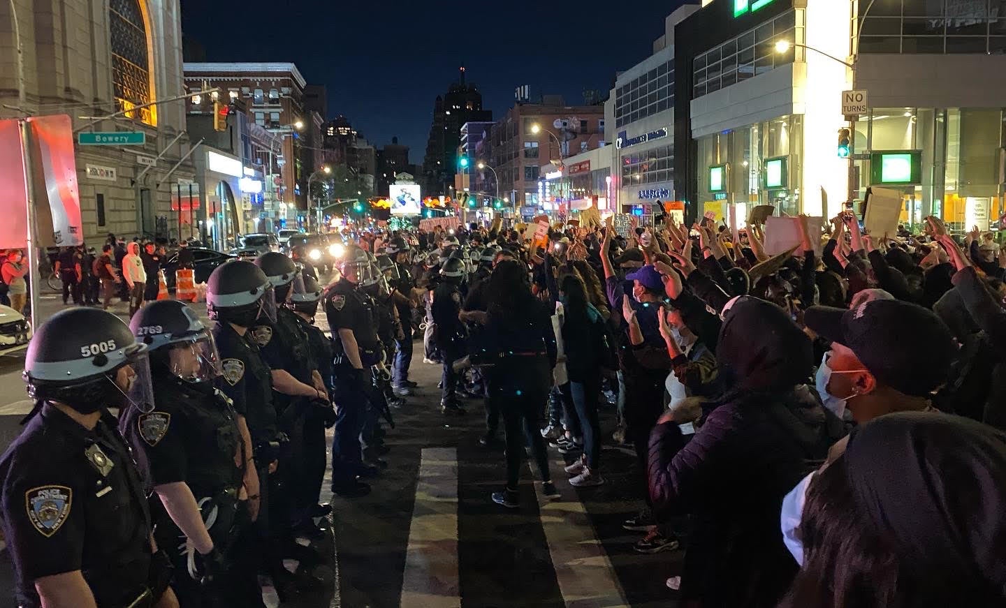 Protesters from the Black Lives Matter movement face-off against police in Manhattan on 31 May, 2020. (Richard Hall / The Independent )