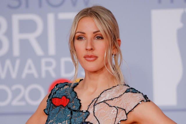 British singer-songwriter Ellie Goulding poses on the red carpet on arrival for the BRIT Awards 2020